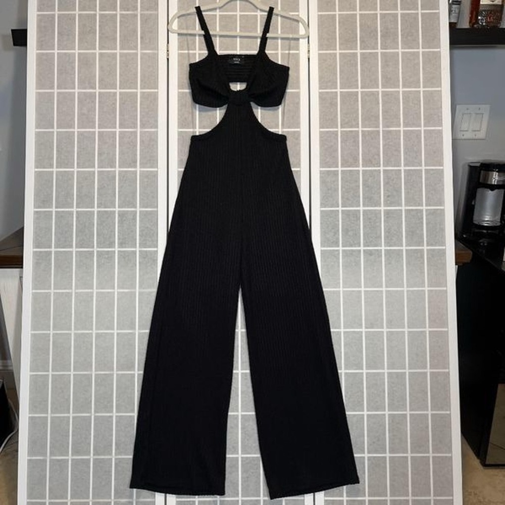 South moon under black jumpsuit never worn